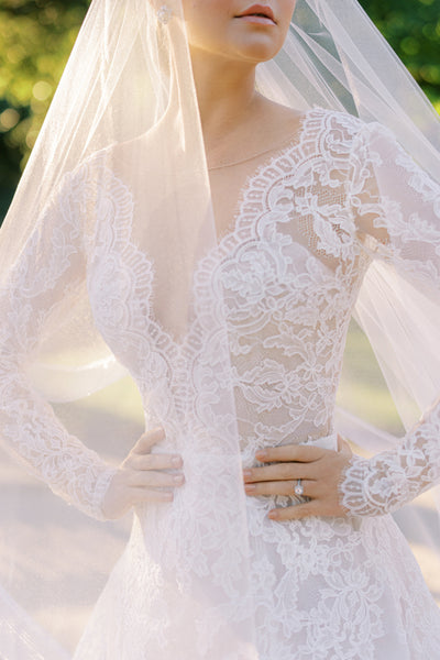http://www.annebarge.com/cdn/shop/products/Florentine-long-sleeve-romatic-lace-a-line-wedding-dress-anne-barge-fall-veil-detail-front_03878149-60b1-4f83-9a12-74d144831961_grande.jpg?v=1642056623